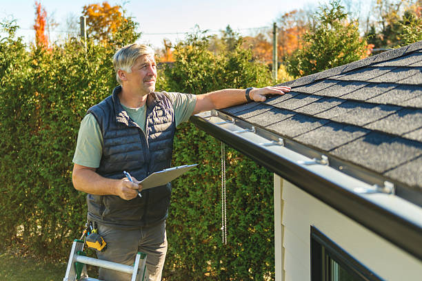 Professional Metal Roofing technician working in Baxter, IA